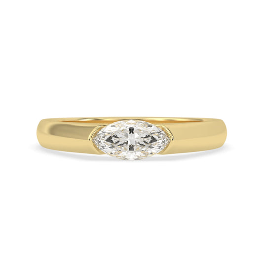 Marquise cut lab grown diamond engagement ring with bezel setting and polished yellow gold tone tapered band