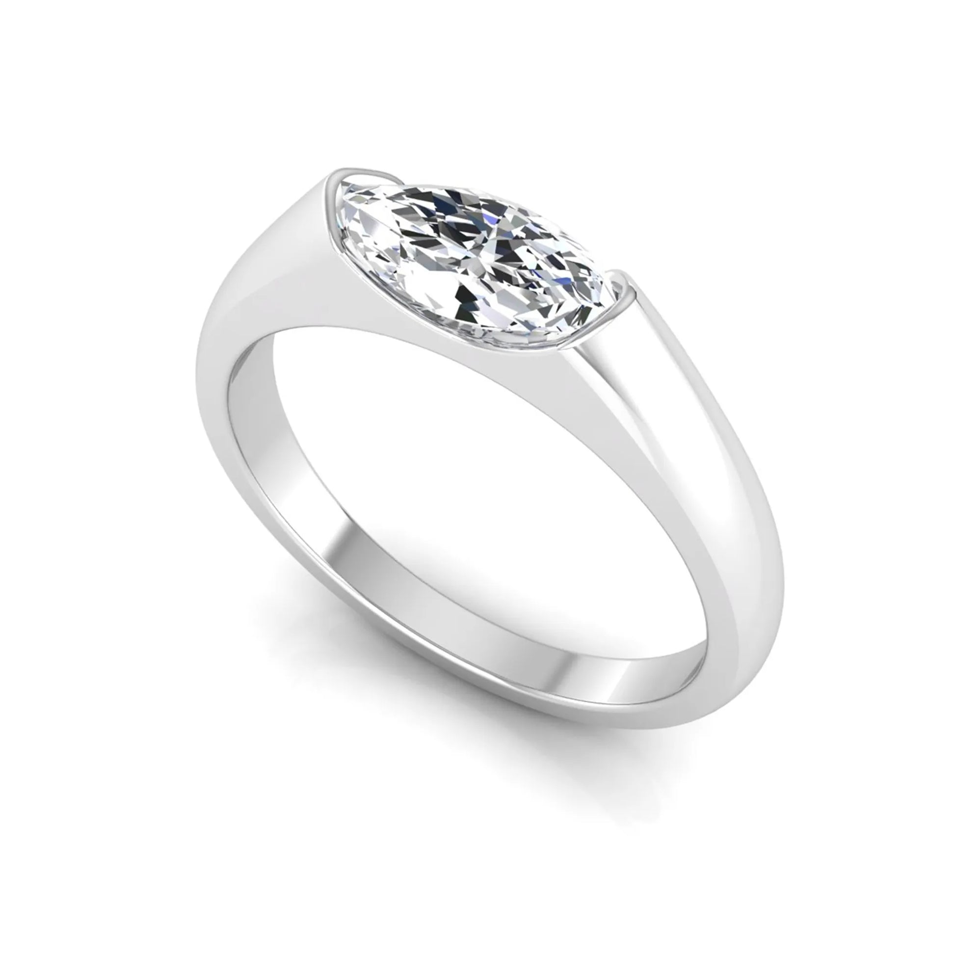 Marquise cut lab grown diamond engagement ring with bezel setting and polished white gold tone tapered band