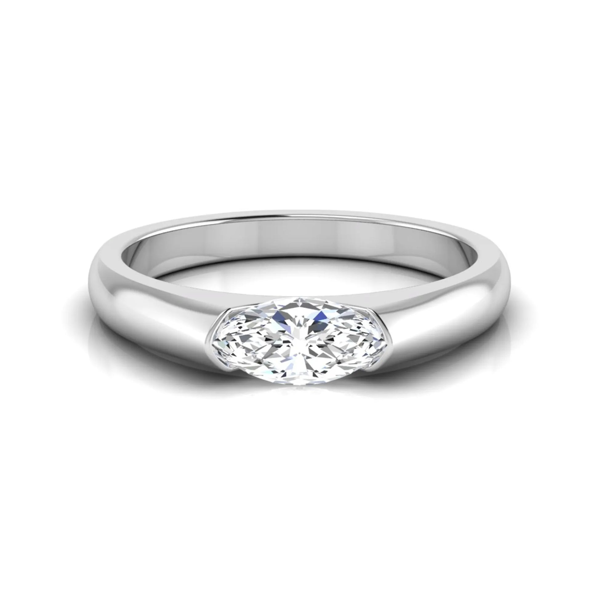 Marquise cut lab grown diamond engagement ring with bezel setting and polished white gold tone tapered band
