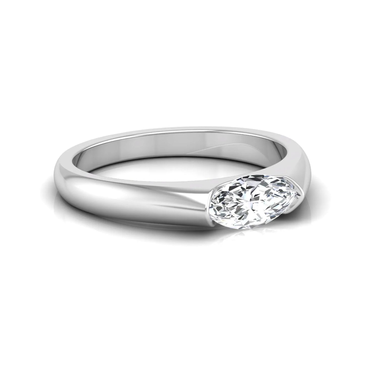 Marquise cut lab grown diamond engagement ring with bezel setting and polished white gold tone tapered band