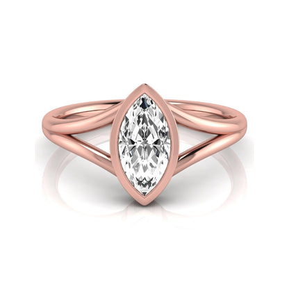 Marquise cut lab grown diamond engagement ring featuring a 1.62 carat center diamond in a modern bezel setting with an elegant split shank and polished rose gold finish.