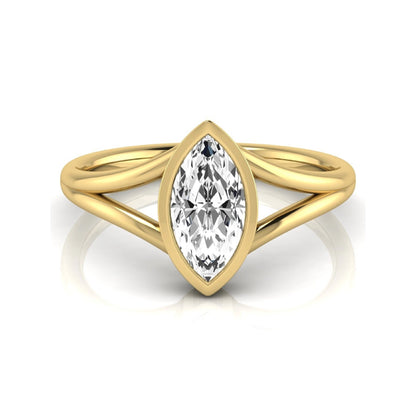 Marquise cut lab grown diamond engagement ring featuring a 1.62 carat center diamond in a modern bezel setting with an elegant split shank and polished yellow gold finish.
