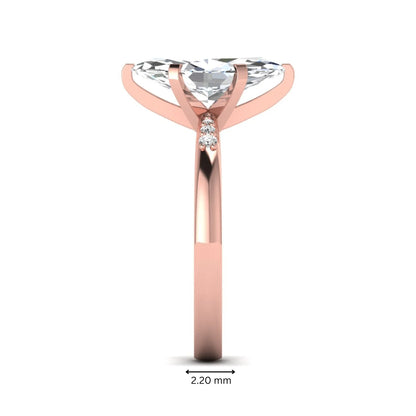 Marquise cut lab grown diamond accent engagement ring featuring a 2.48 carat IGI certified center diamond with round diamond shoulder accents in rose gold.
