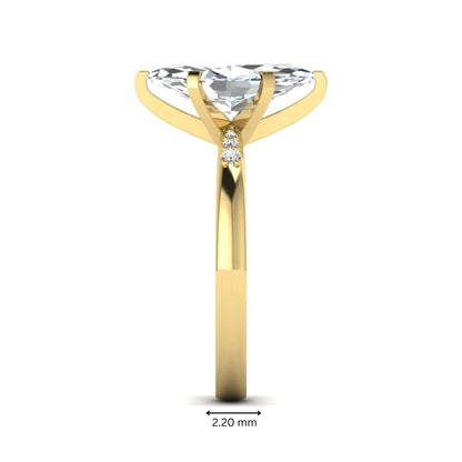 Marquise cut lab grown diamond accent engagement ring featuring a 2.48 carat IGI certified center diamond with round diamond shoulder accents in yellow gold.