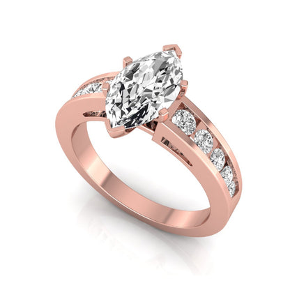 Marquise cut lab grown diamond engagement ring featuring a 0.95 carat IGI certified center diamond with channel set round side diamonds in rose gold.