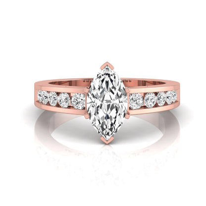 Marquise cut lab grown diamond engagement ring featuring a 0.95 carat IGI certified center diamond with channel set round side diamonds in rose gold.