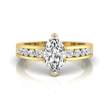 Marquise cut lab grown diamond engagement ring featuring a 0.95 carat IGI certified center diamond with channel set round side diamonds in yellow gold.