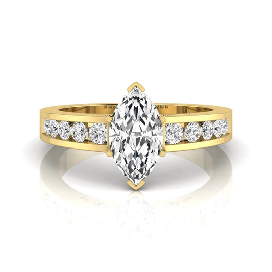 Marquise cut lab grown diamond engagement ring featuring a 0.95 carat IGI certified center diamond with channel set round side diamonds in yellow gold.