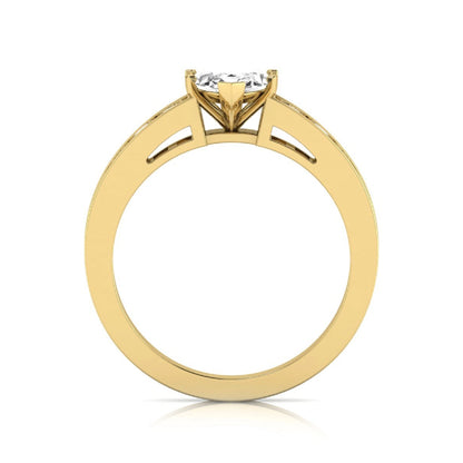 Marquise cut lab grown diamond engagement ring featuring a 0.95 carat IGI certified center diamond with channel set round side diamonds in yellow gold.