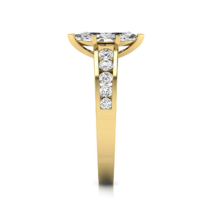 Marquise cut lab grown diamond engagement ring featuring a 0.95 carat IGI certified center diamond with channel set round side diamonds in yellow gold.