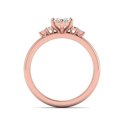 IGI certified marquise cut lab grown diamond five stone engagement ring with baguette and princess cut side diamonds in rose gold.