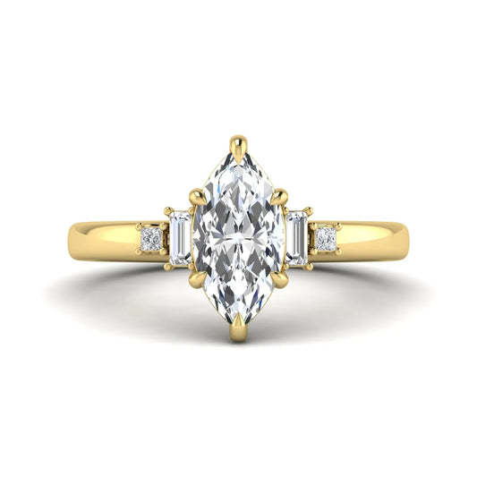 IGI certified marquise cut lab grown diamond five stone engagement ring with baguette and princess cut side diamonds in yellow gold.