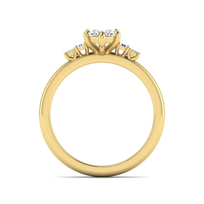 IGI certified marquise cut lab grown diamond five stone engagement ring with baguette and princess cut side diamonds in yellow gold.