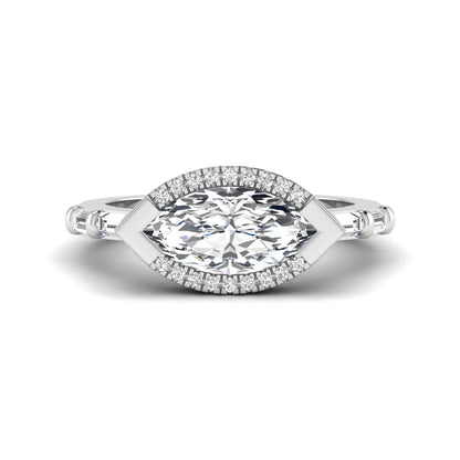 Marquise cut lab grown diamond halo engagement ring with round halo, baguette side diamonds, and white gold tone band.