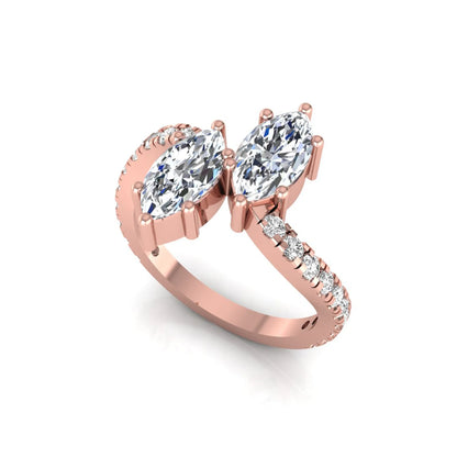 Marquise cut lab grown diamond Toi et Moi ring with pavé round diamond accents in a rose gold design