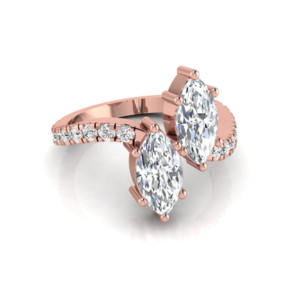 Marquise cut lab grown diamond Toi et Moi ring with pavé round diamond accents in a rose gold design