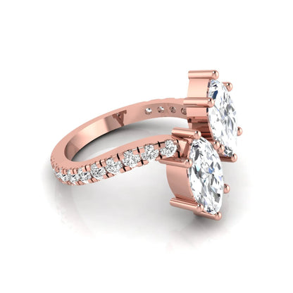 Marquise cut lab grown diamond Toi et Moi ring with pavé round diamond accents in a rose gold design