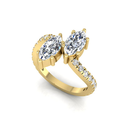 Marquise cut lab grown diamond Toi et Moi ring with pavé round diamond accents in a yellow gold design
