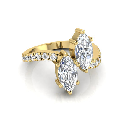 Marquise cut lab grown diamond Toi et Moi ring with pavé round diamond accents in a yellow gold design