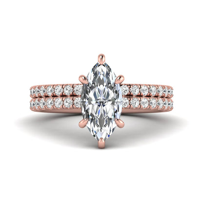 Marquise cut lab grown diamond bridal ring set featuring a pavé solitaire engagement ring with matching diamond wedding band in rose gold.