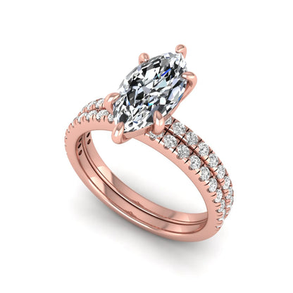 Marquise cut lab grown diamond bridal ring set featuring a pavé solitaire engagement ring with matching diamond wedding band in rose gold.