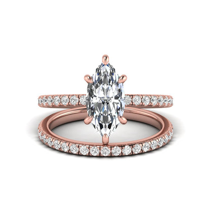 Marquise cut lab grown diamond bridal ring set featuring a pavé solitaire engagement ring with matching diamond wedding band in rose gold.
