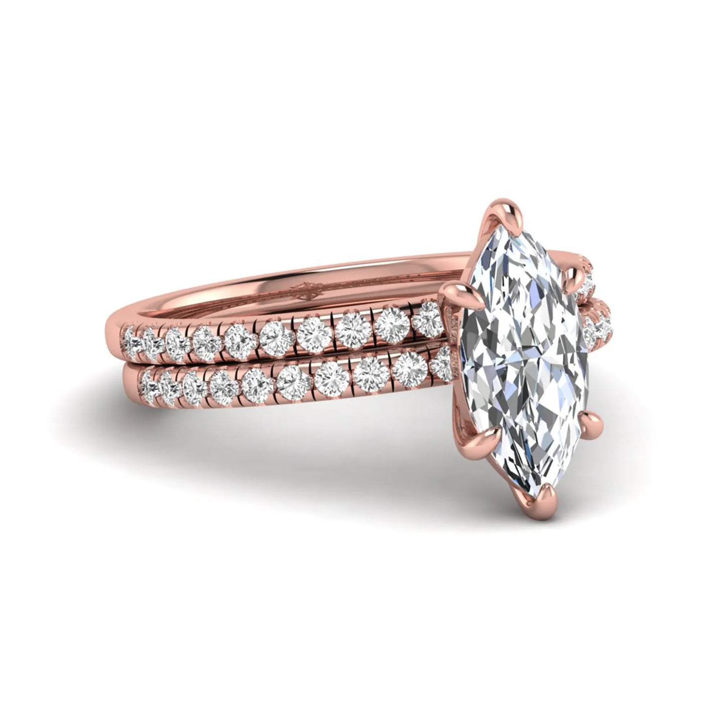 Marquise cut lab grown diamond bridal ring set featuring a pavé solitaire engagement ring with matching diamond wedding band in rose gold.