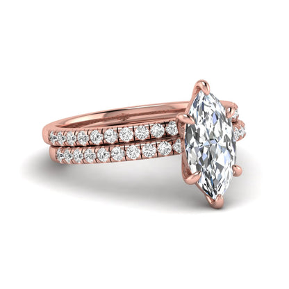 Marquise cut lab grown diamond bridal ring set featuring a pavé solitaire engagement ring with matching diamond wedding band in rose gold.