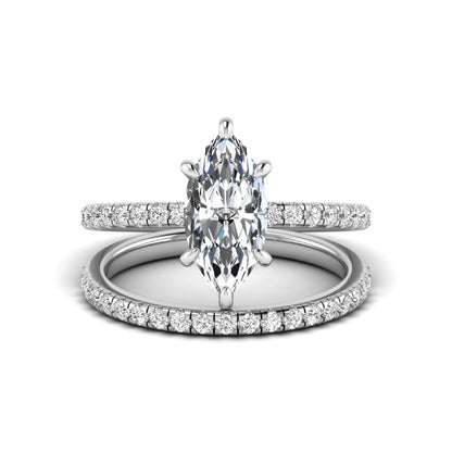 Marquise cut lab grown diamond bridal ring set featuring a pavé solitaire engagement ring with matching diamond wedding band in white gold.