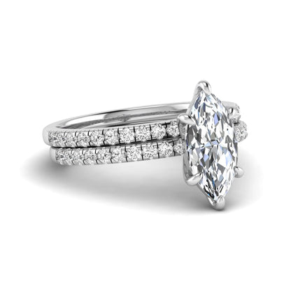 Marquise cut lab grown diamond bridal ring set featuring a pavé solitaire engagement ring with matching diamond wedding band in white gold.