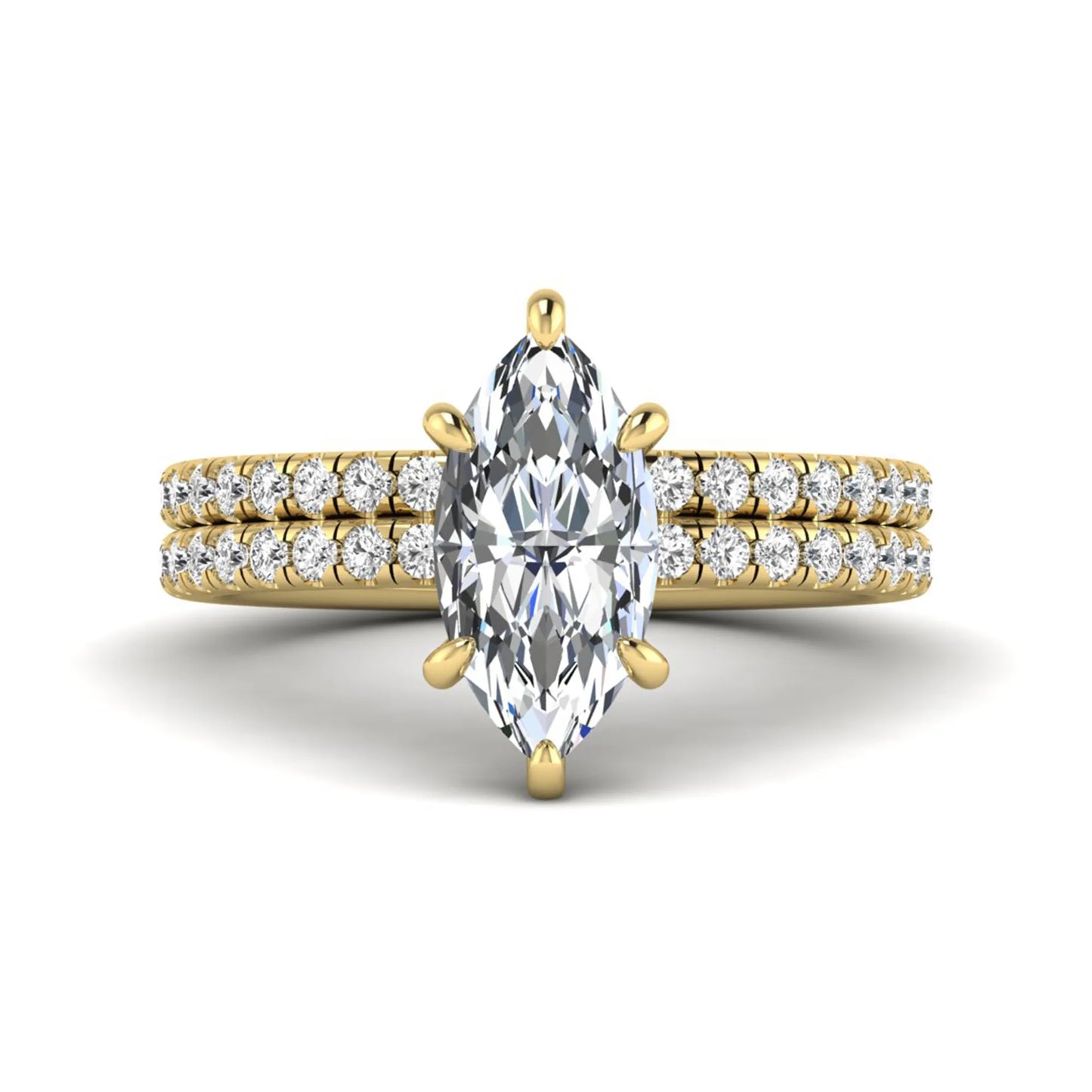Marquise cut lab grown diamond bridal ring set featuring a pavé solitaire engagement ring with matching diamond wedding band in yellow gold.