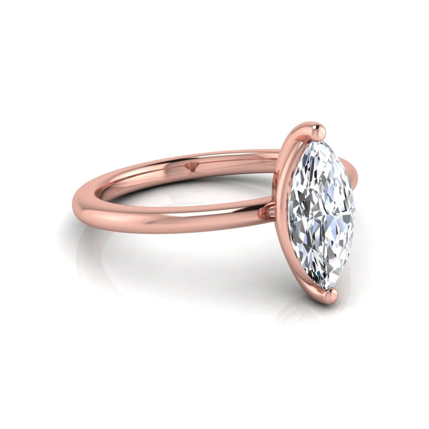 Marquise cut solitaire lab grown diamond engagement ring featuring a 0.95 carat marquise cut center diamond in rose gold.