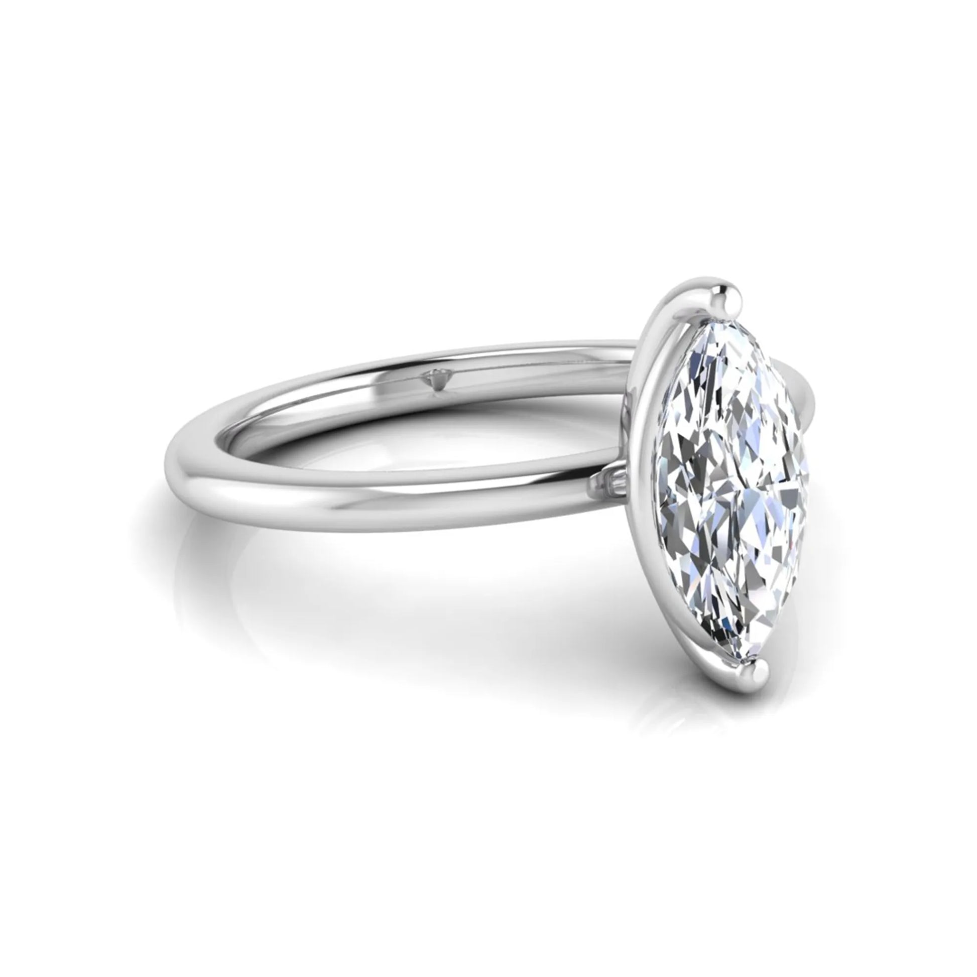 Marquise cut solitaire lab grown diamond engagement ring featuring a 0.95 carat marquise cut center diamond in white gold.