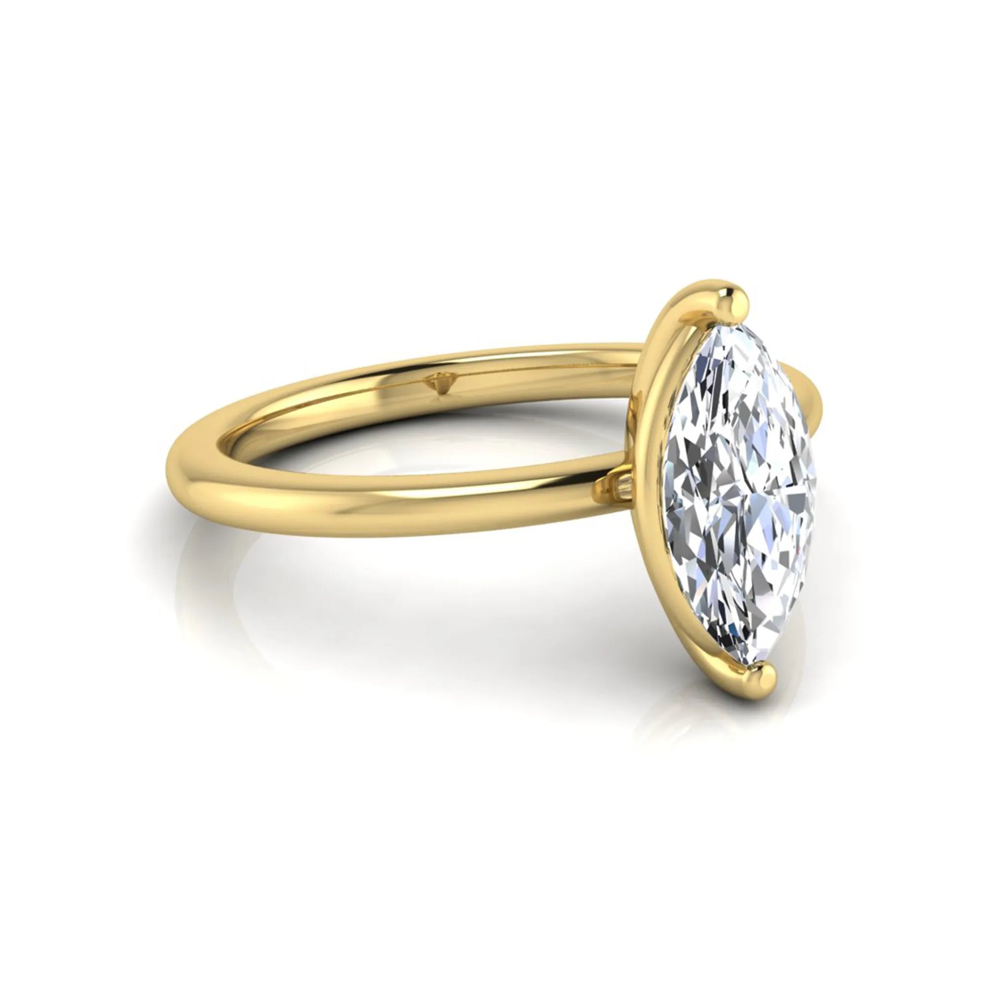 Marquise cut solitaire lab grown diamond engagement ring featuring a 0.95 carat marquise cut center diamond in yellow gold.