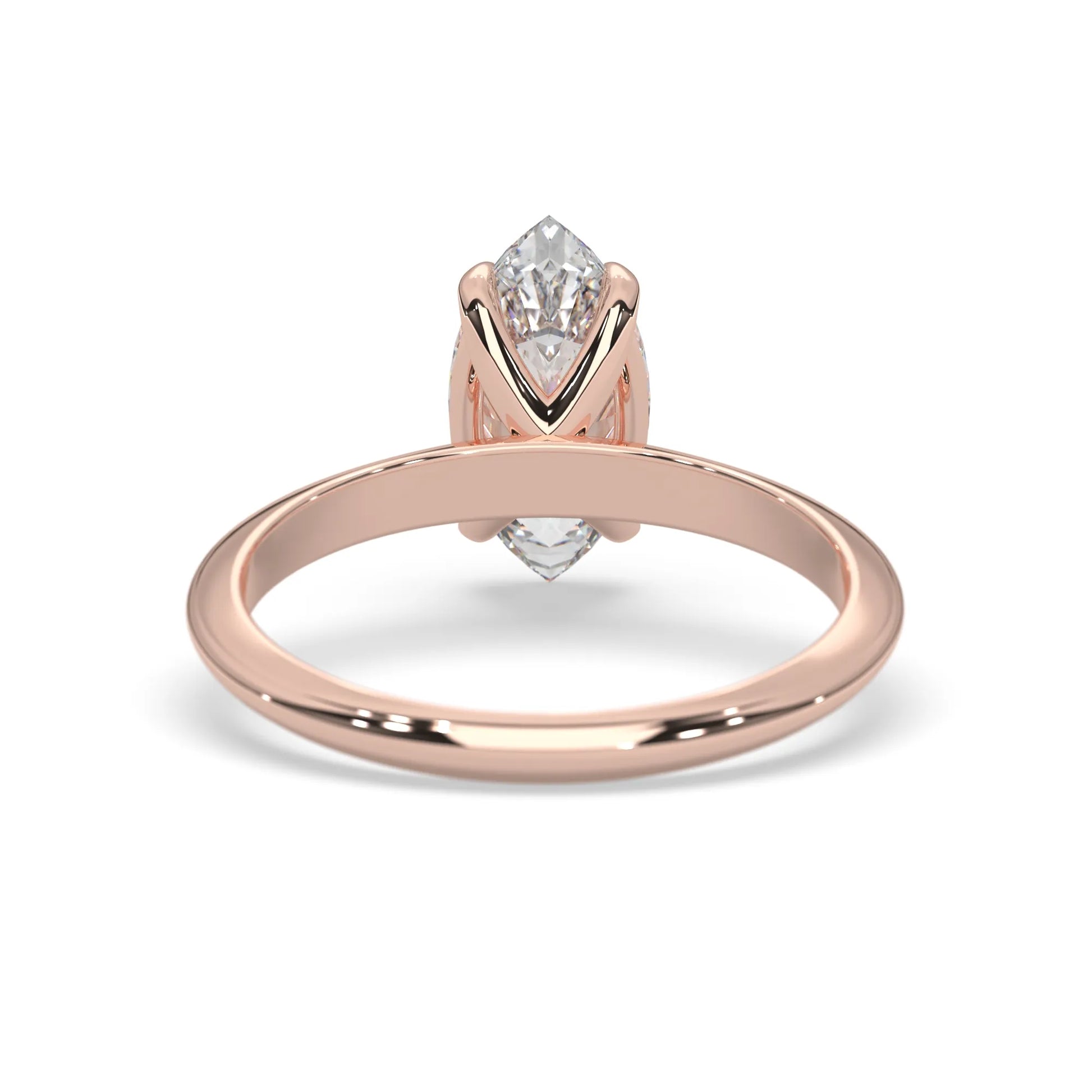 Rose-gold ring with a diamond on a white background