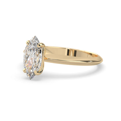 yellow-Gold ring with a large diamond on a white background