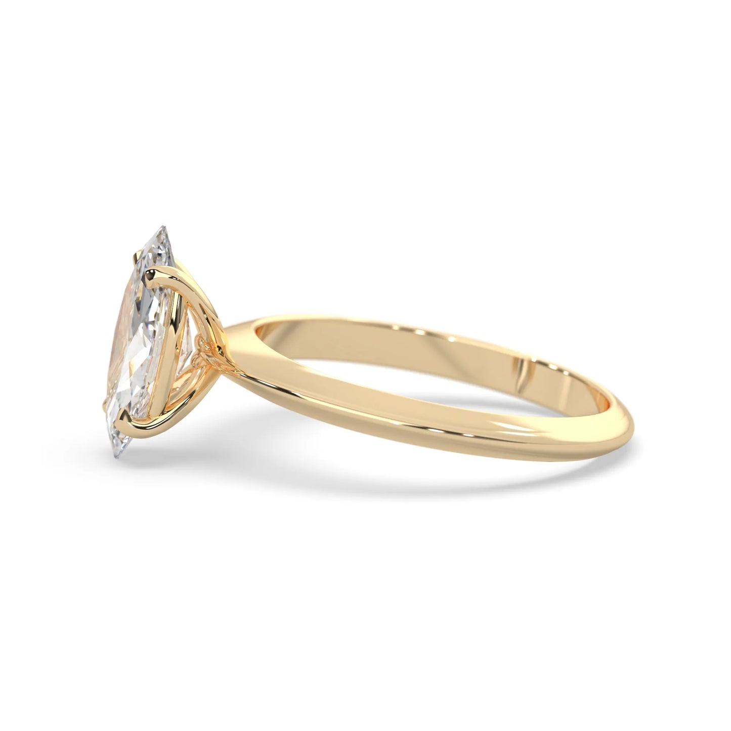 yellow-Gold ring with a pear-shaped diamond on a white background