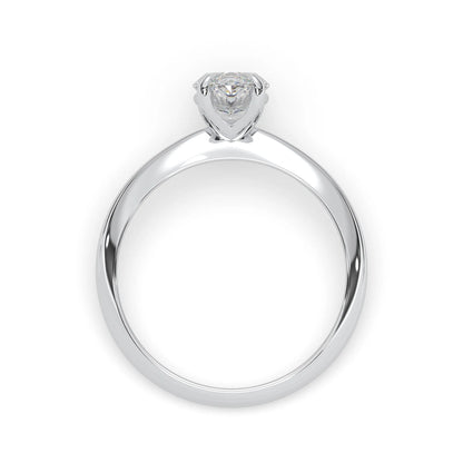 white-gold  ring with a heart-shaped diamond on a white background