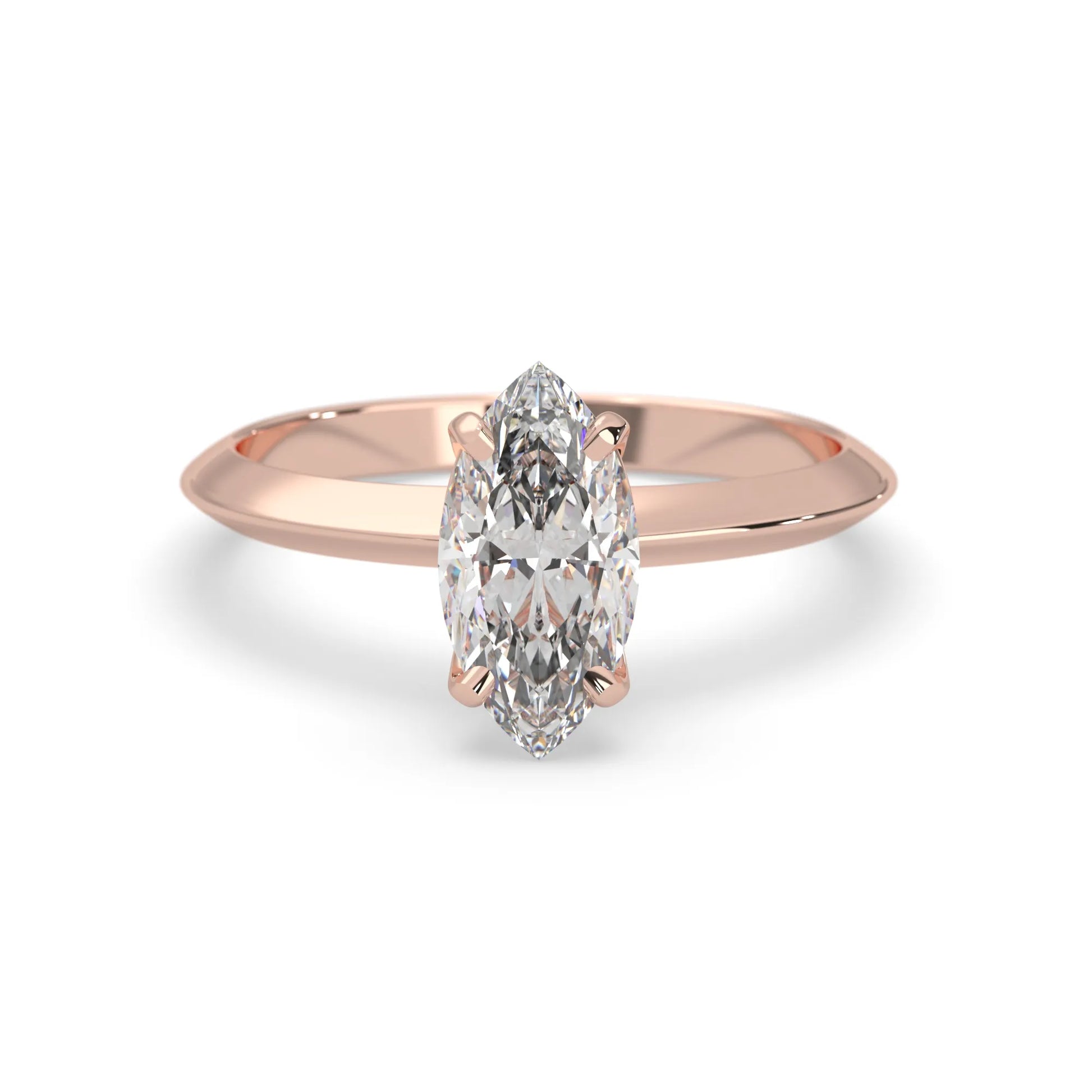 Rose-gold ring with a marquise-shaped diamond on a white background