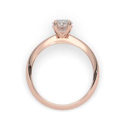 Rose-gold ring with a diamond on a white background