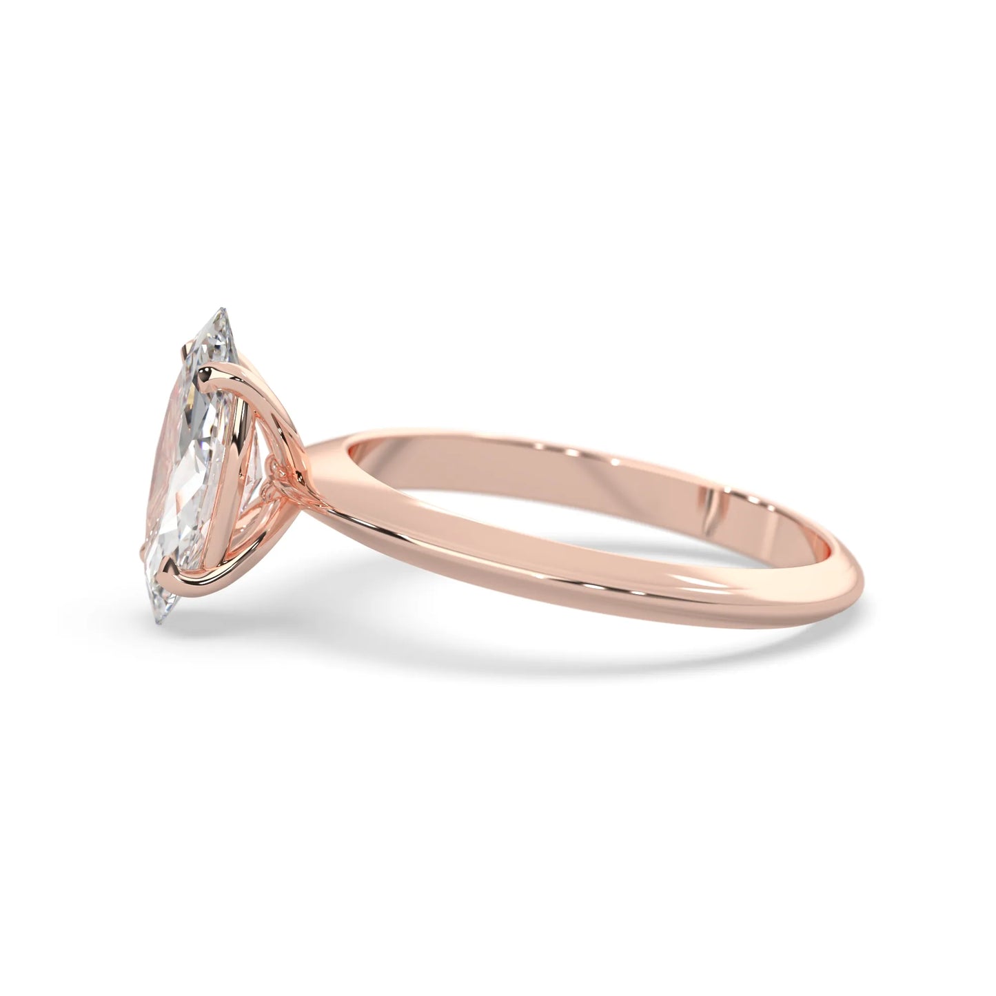 Rose-gold ring with a marquise-shaped diamond on a white background