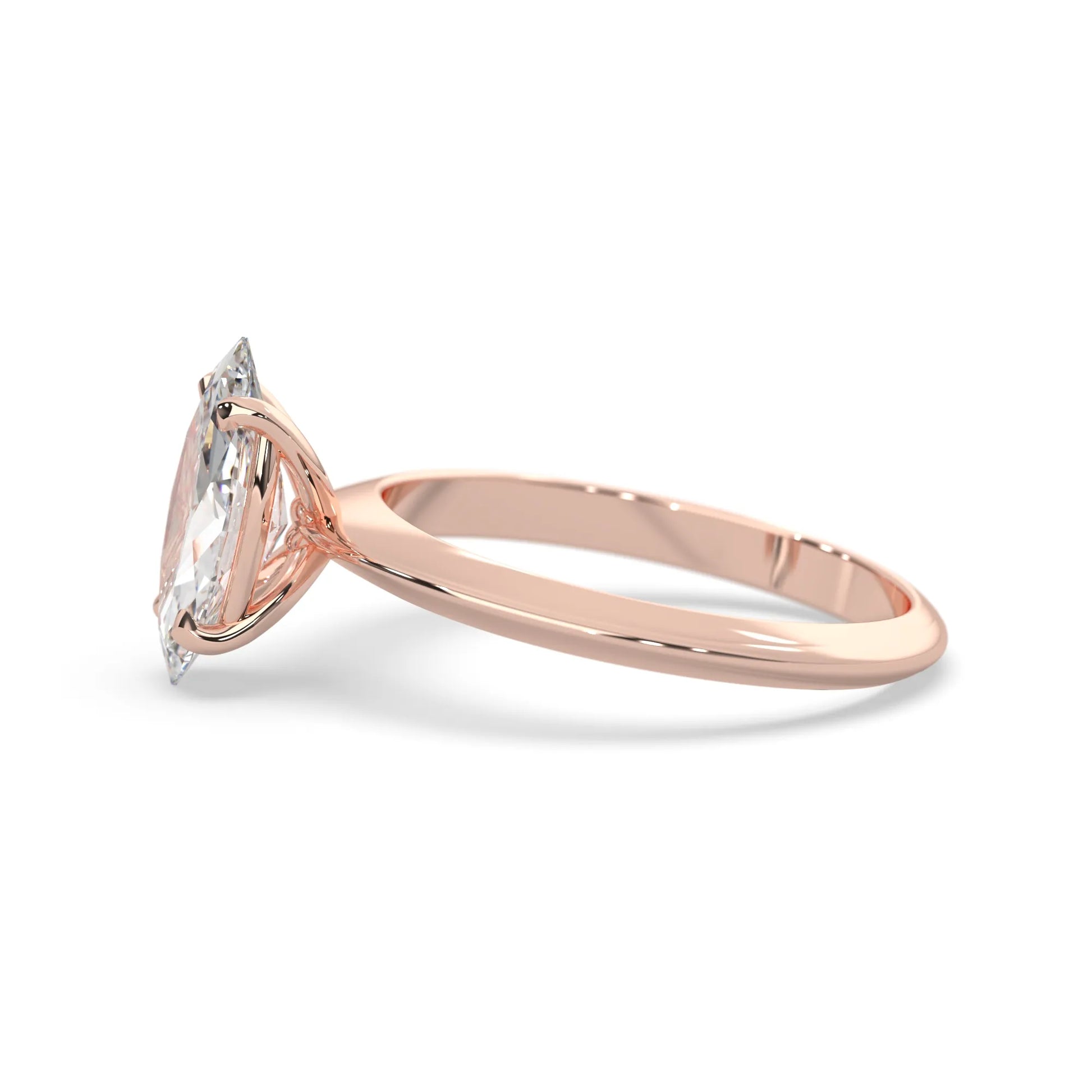 Rose-gold ring with a marquise-shaped diamond on a white background