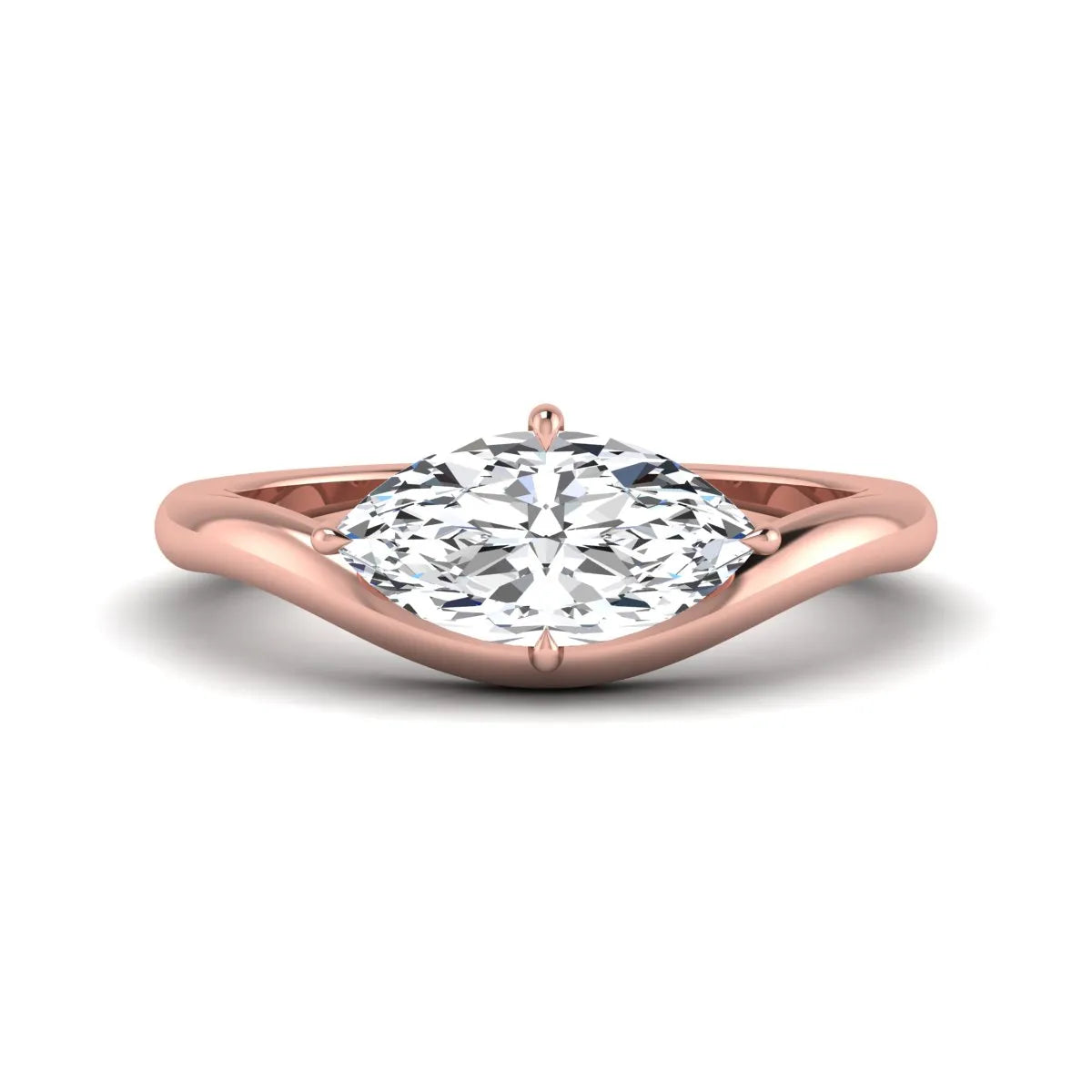 Marquise cut lab grown diamond solitaire engagement ring featuring a four prong cathedral setting with a polished 2 mm band in rose gold tone.