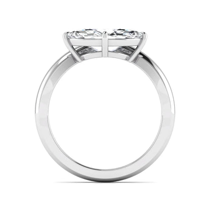 Marquise cut lab grown diamond solitaire engagement ring featuring a four prong cathedral setting with a polished 2 mm band in white gold tone.