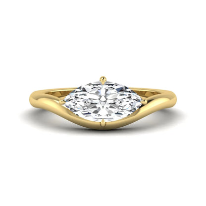 Marquise cut lab grown diamond solitaire engagement ring featuring a four prong cathedral setting with a polished 2 mm band in yellow gold tone.