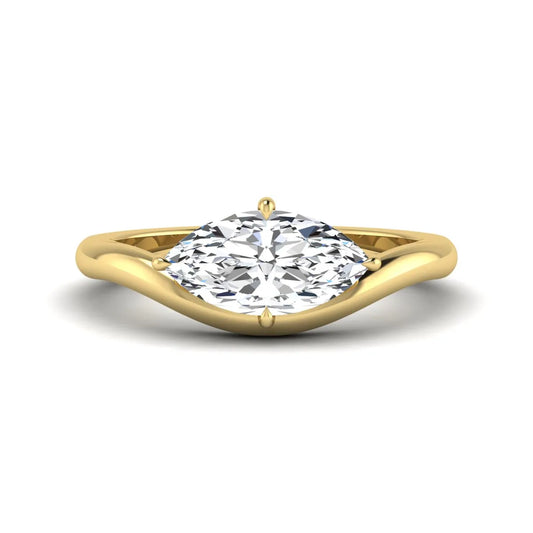 Marquise cut lab grown diamond solitaire engagement ring featuring a four prong cathedral setting with a polished 2 mm band in yellow gold tone.