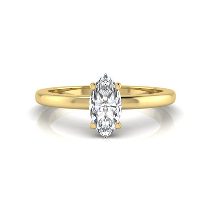 Marquise cut lab grown diamond solitaire engagement ring with four prong setting on yellow gold tone band