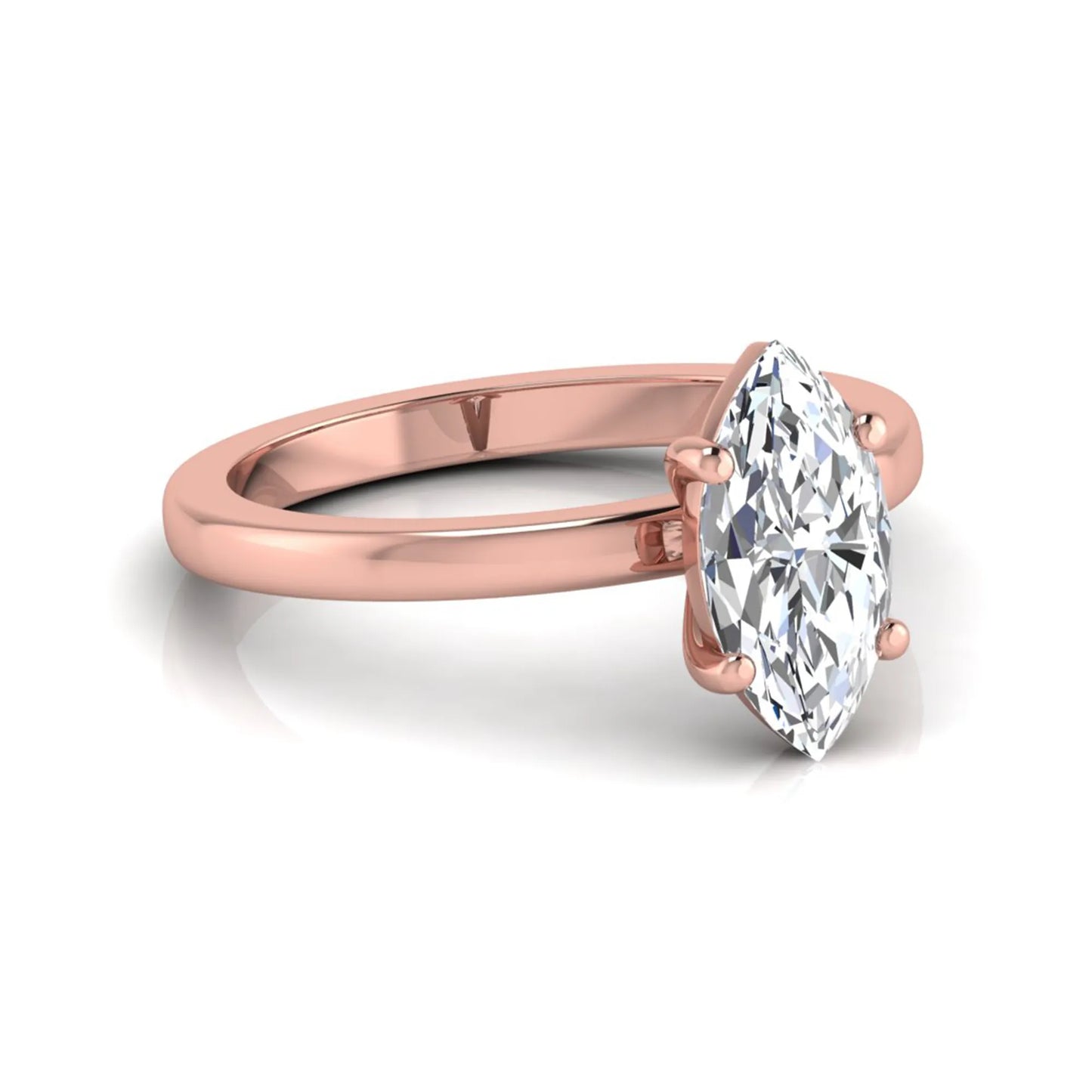 Marquise cut four prong lab grown diamond solitaire engagement ring with rose gold tone design