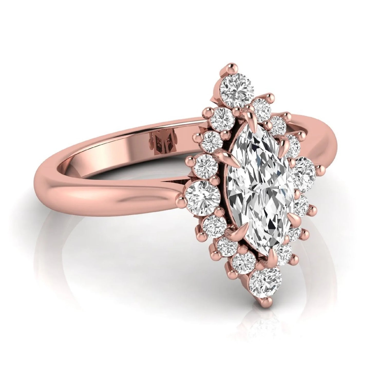 Marquise cut lab grown diamond engagement ring featuring a round diamond halo in a rose gold tone setting.