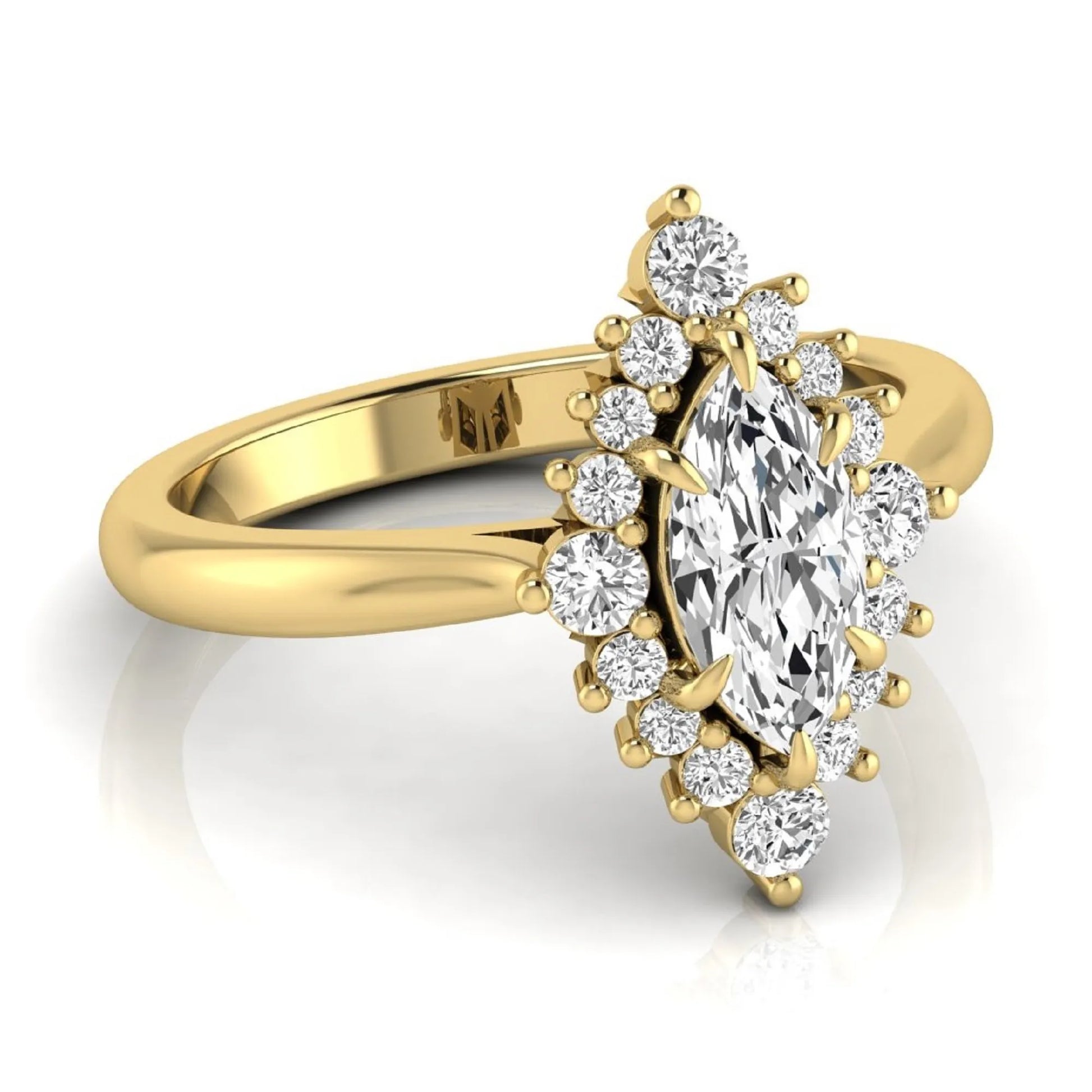 Marquise cut lab grown diamond engagement ring featuring a round diamond halo in a yellow gold tone setting.